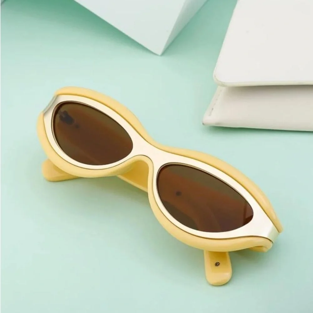 Luxury futuristic cat eye oval mustard pastel yellow steampunk sunglasses